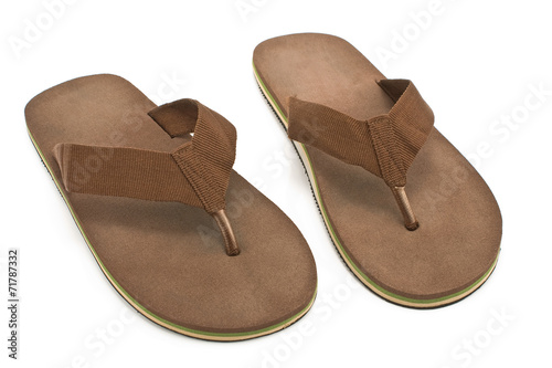 Pair of brown men's flip flop sandals isolated on white