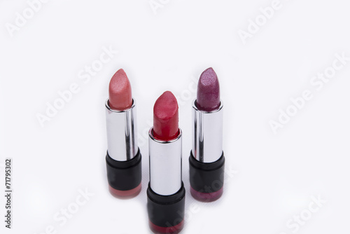 Close up of various colors of lipstick (make-up, background)