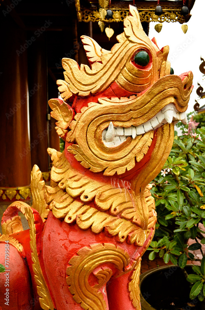 Obraz premium stone gardian lion at the Buddha Temple, Thailand