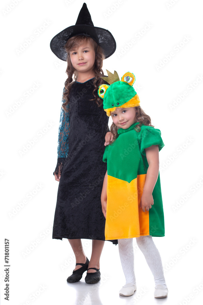 Two smiling sisters posing in carnival costumes Two smiling sisters posing in carnival costumes
