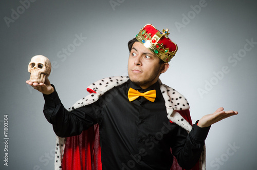 Concept with funny man wearing crown