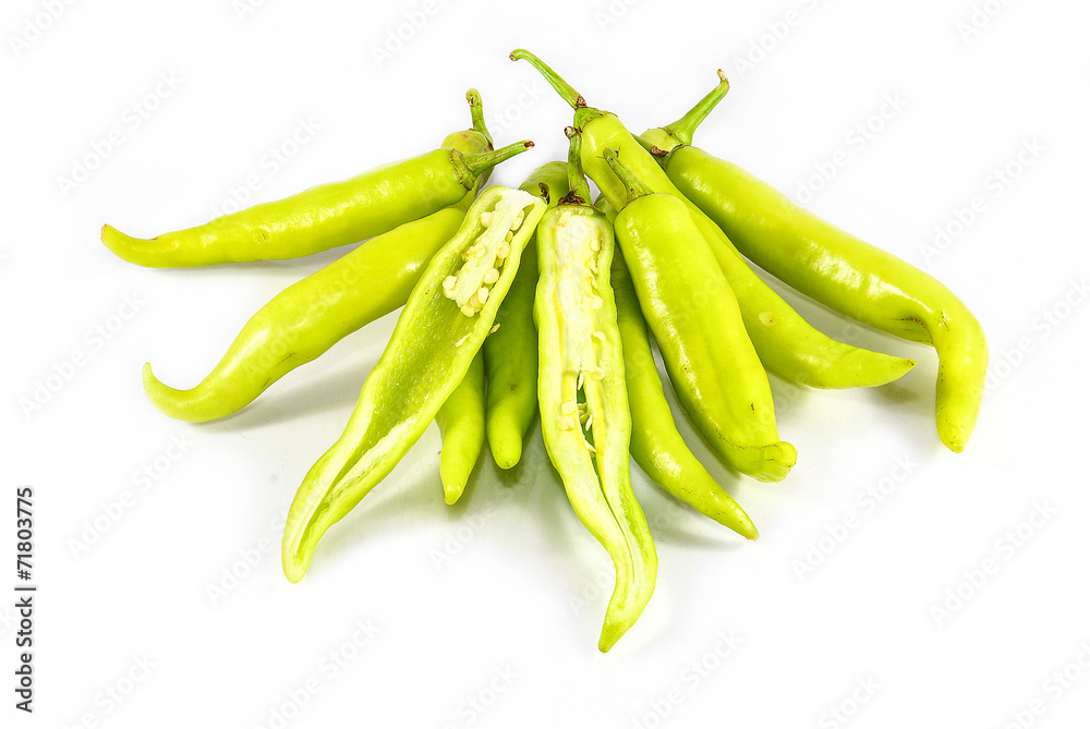 green sweet peppers on a white background green sweet peppers on a white background