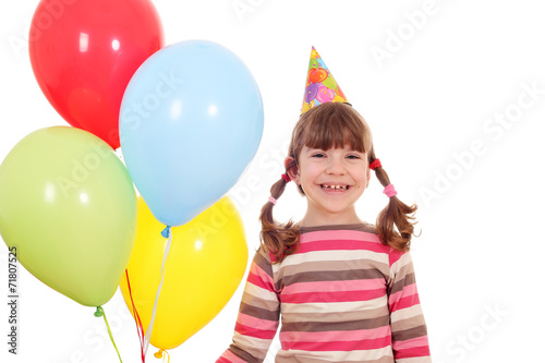 happy little girl with balloons birthday party