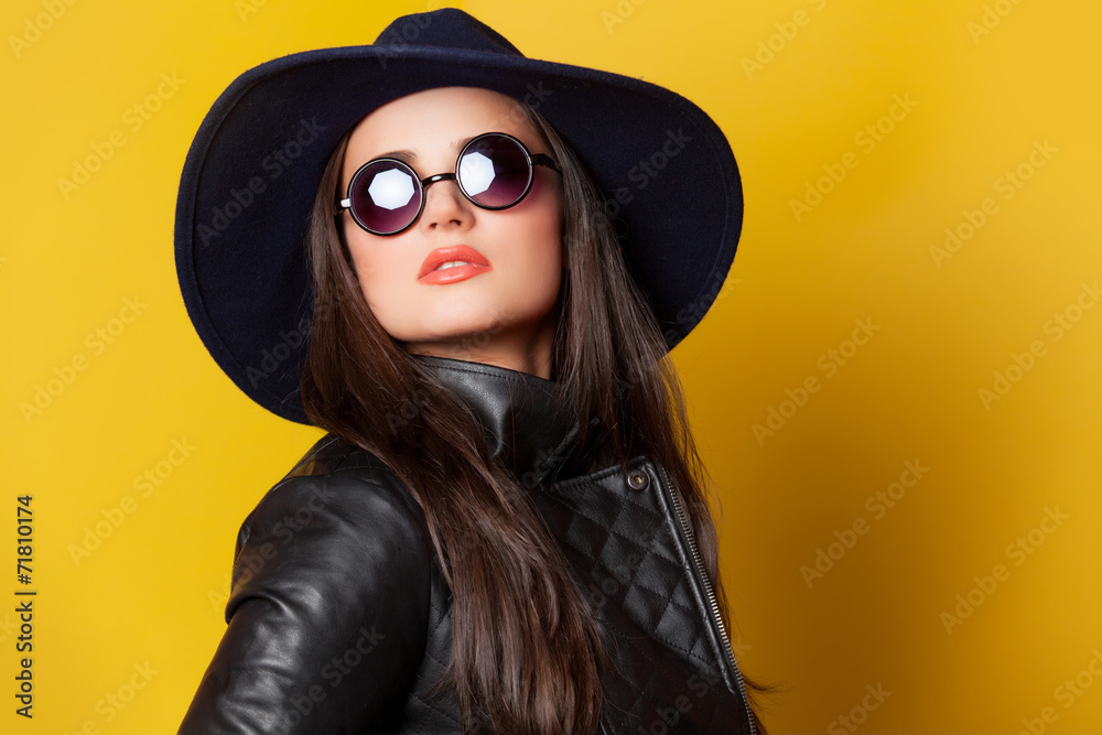 Style brunette girl on yellow background. Style brunette girl on yellow background.