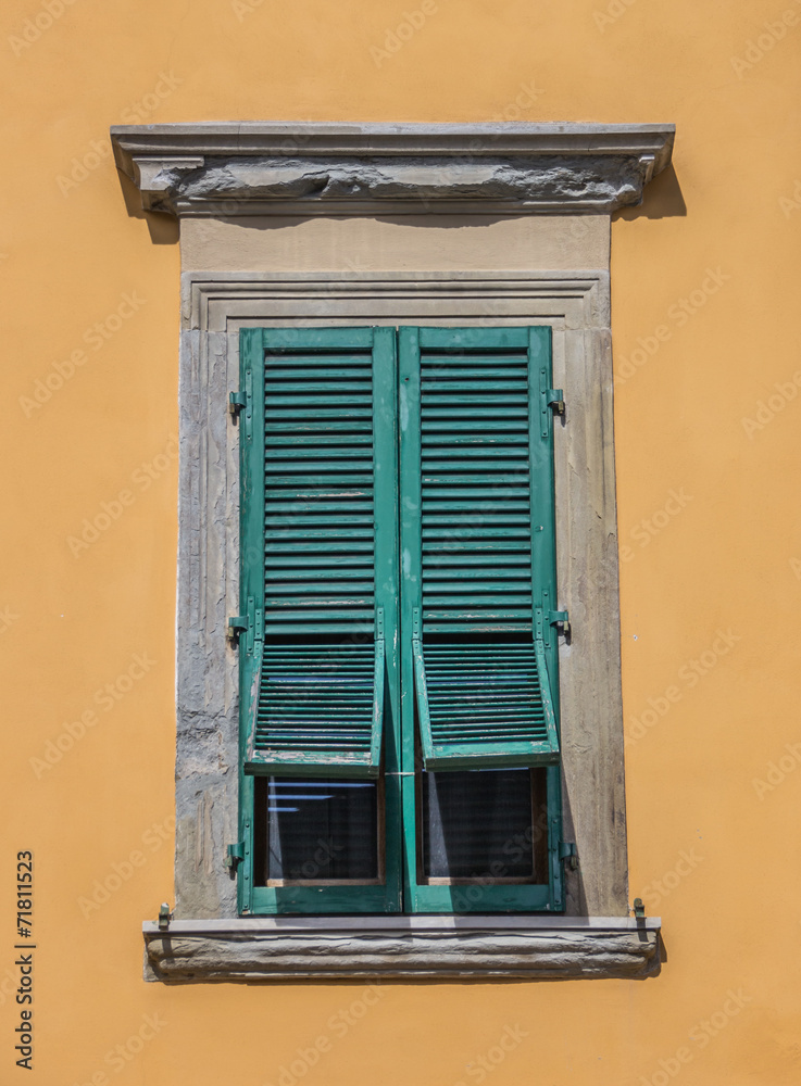 Typical Italian window with blinds half open