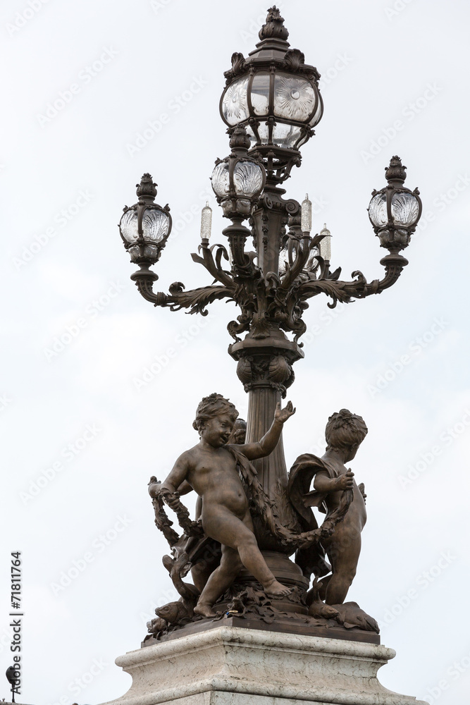 Street lantern on the Alexandre III Bridge in Paris, France. Street lantern on the Alexandre III Bridge in Paris, France.