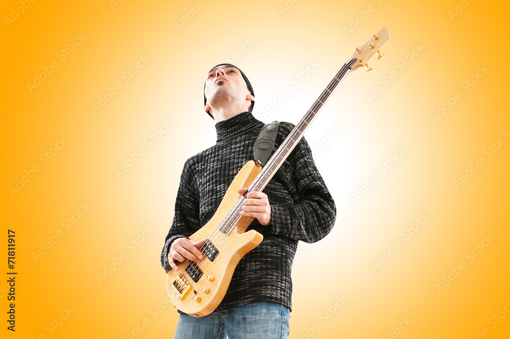 Guitar player isolated on the white background Guitar player isolated on the white background