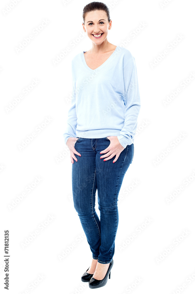Fototapeta premium Smiling female model in trendy casuals