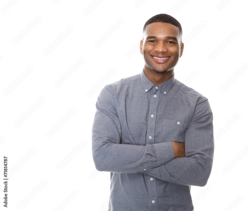 Modern young black man smiling with arms crossed Modern young black man smiling with arms crossed