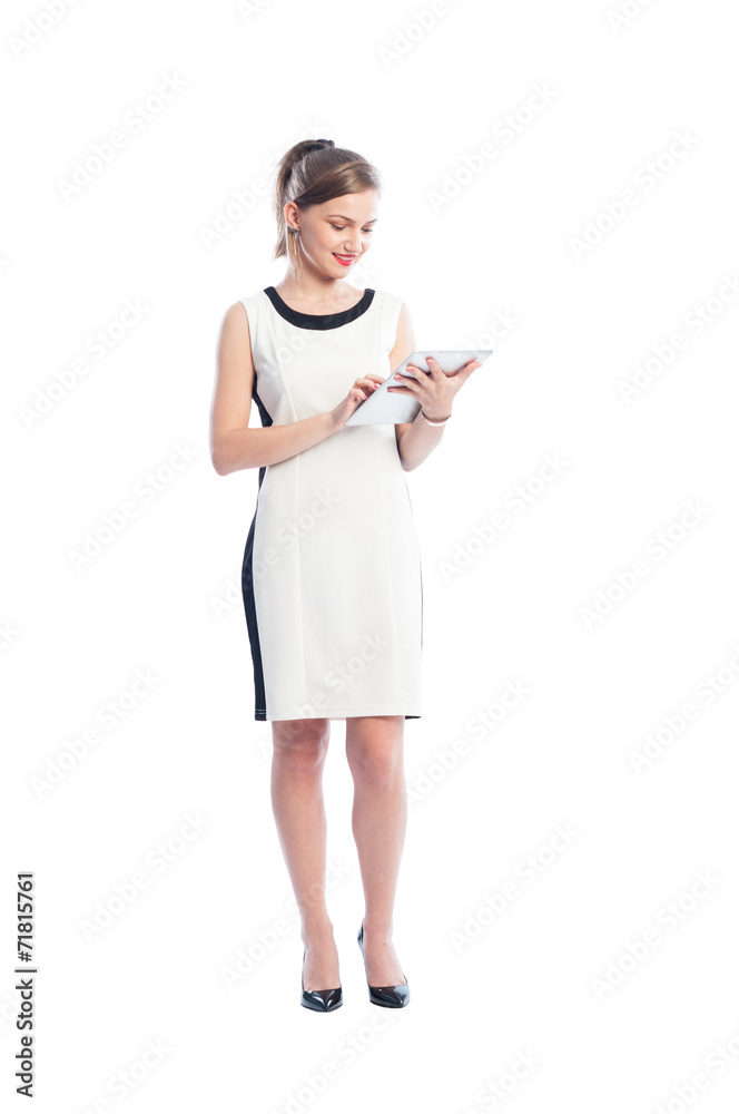Business woman holding and working with a tablet. Business woman holding and working with a tablet.