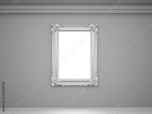 Vintage mirror with silver frame on the wall