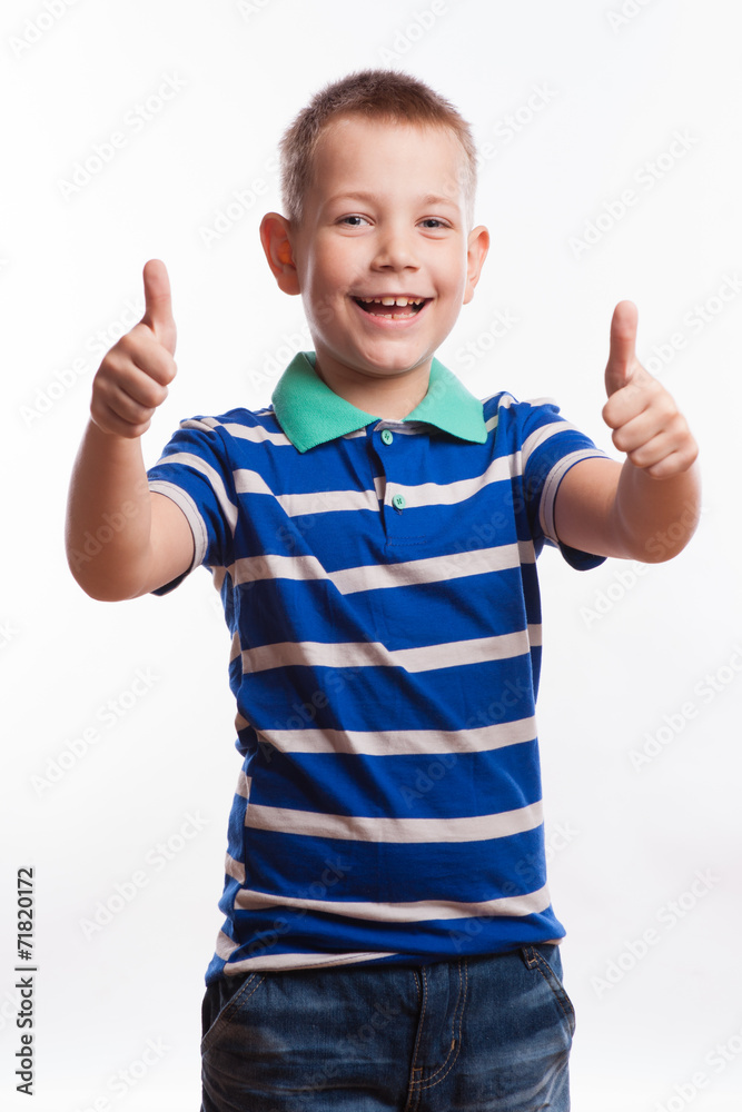 Portrait of happy boy showing thumbs up gesture, Portrait of happy boy showing thumbs up gesture,