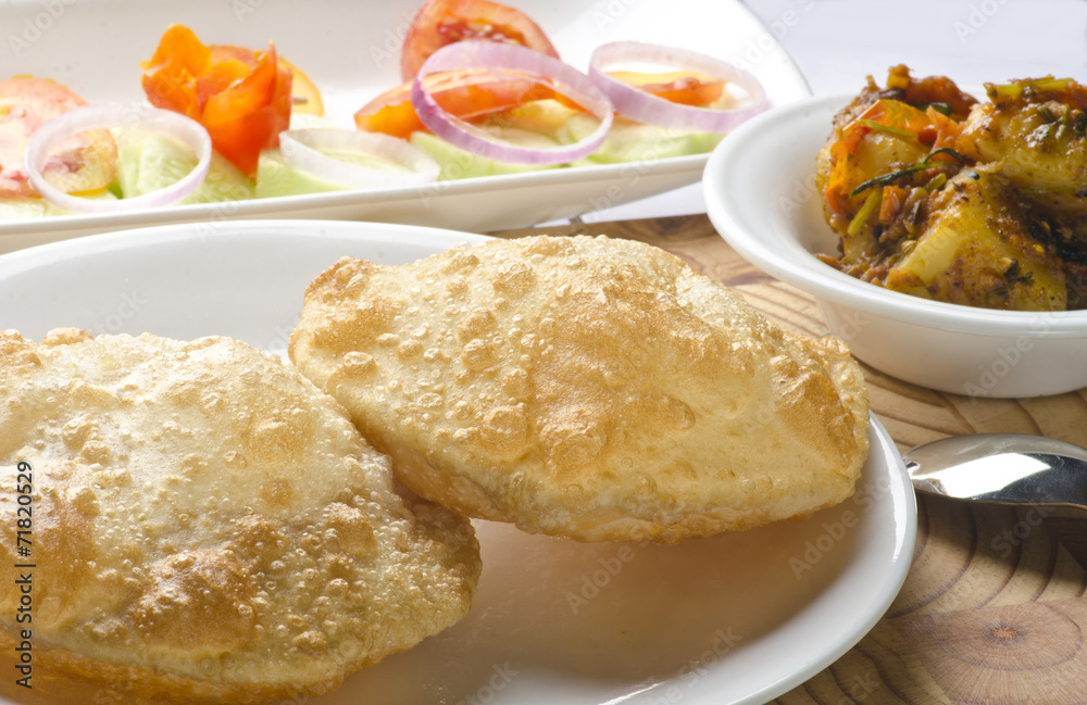 Yummy puri with potato dum curry