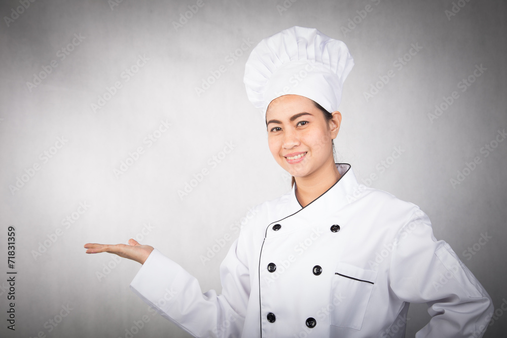Woman chef showing and presenting Woman chef showing and presenting
