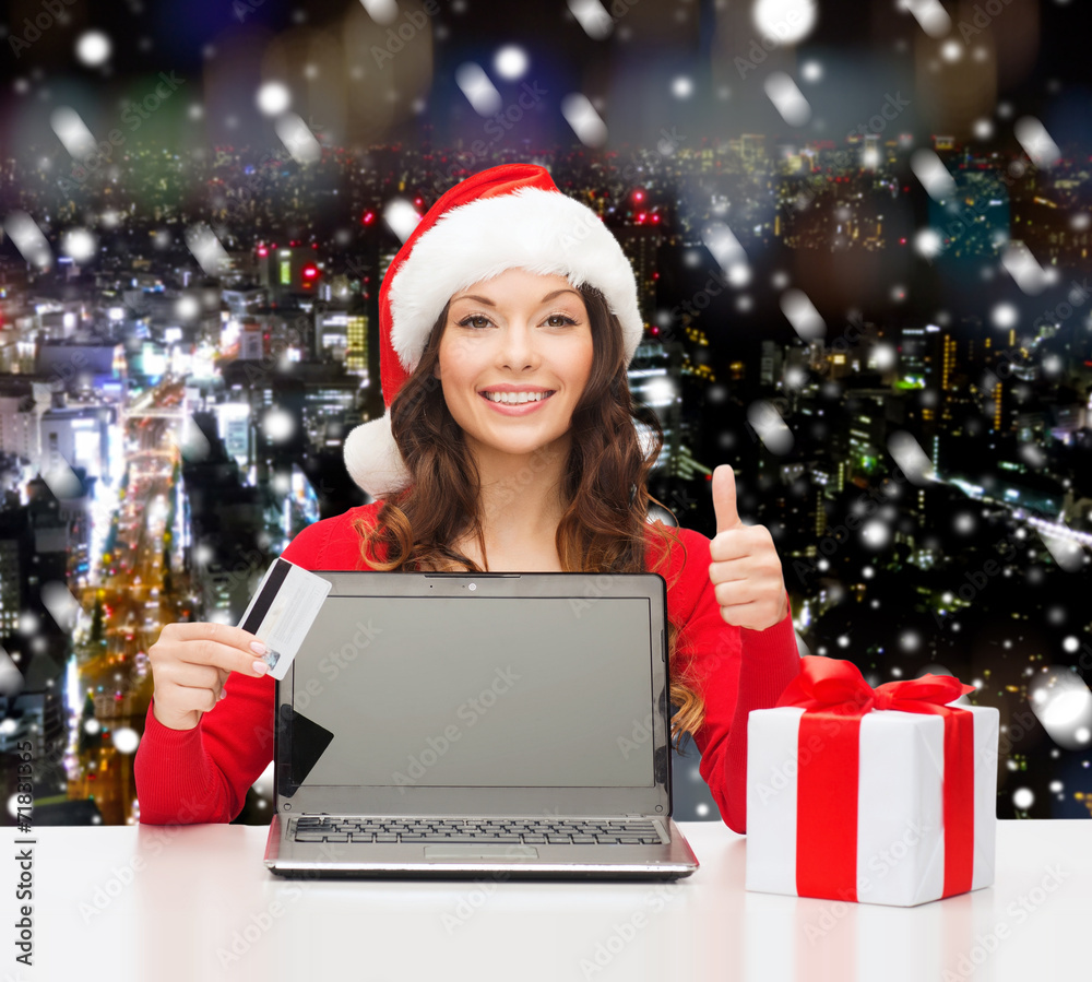 smiling woman with credit card and laptop smiling woman with credit card and laptop