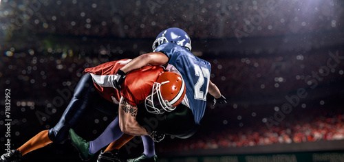 Canvas Print American football player in action at game time