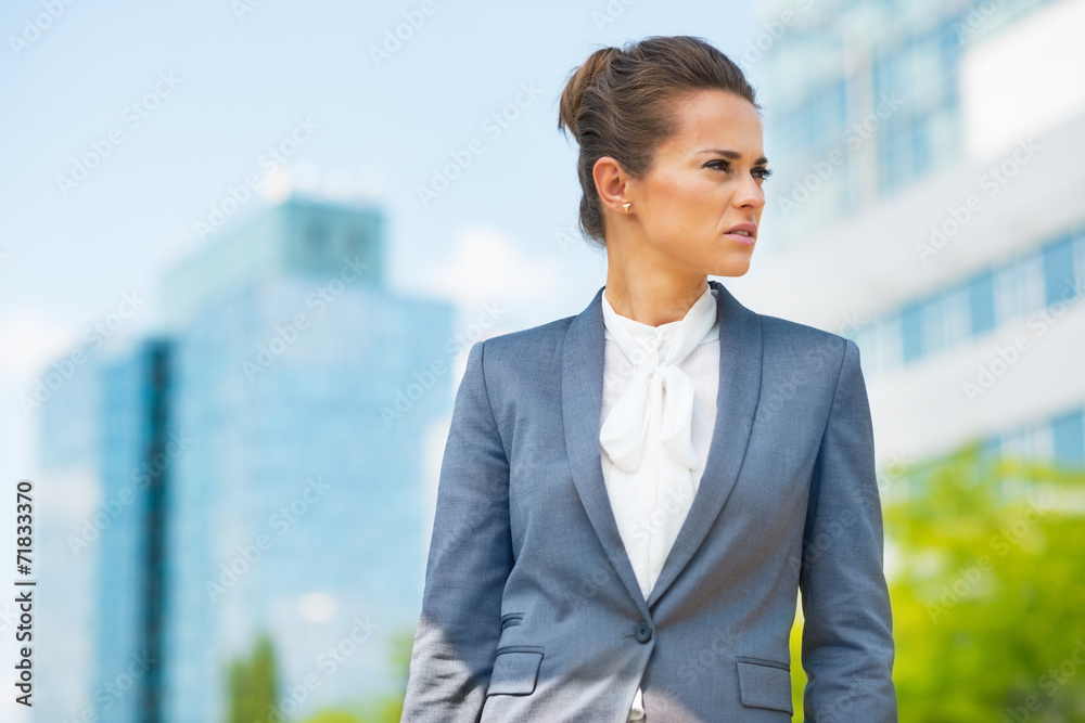 Portrait of business woman in office district Portrait of business woman in office district
