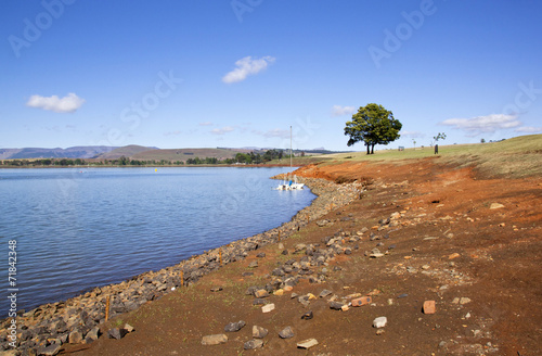 Exposed Bank Showing Drop in Level of Midmar Dam photo