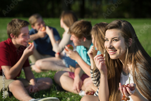 Teen Girl Eating Grapes