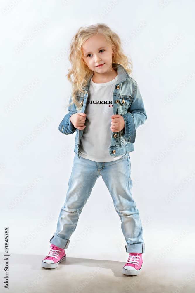 Little fashionista posing in denim suit Little fashionista posing in denim suit