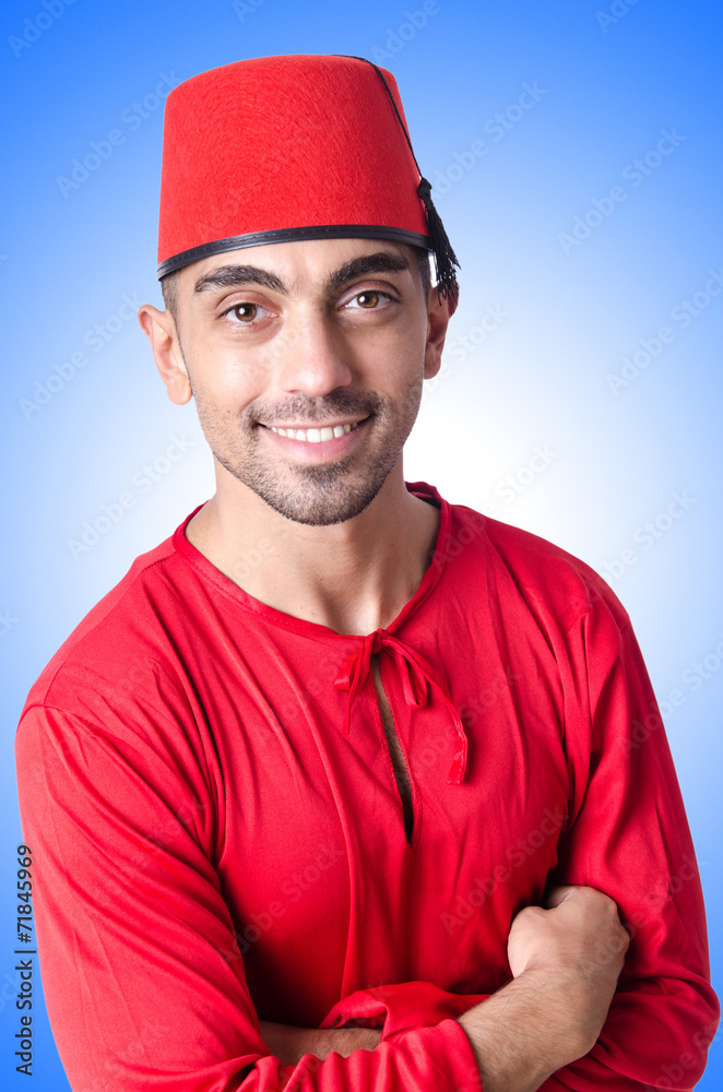 Man in traditional turkish hat and dress Man in traditional turkish hat and dress