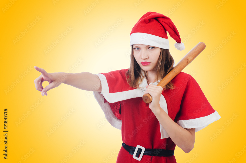 Young woman in red santa costume on white Young woman in red santa costume on white