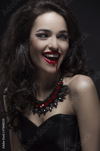 Portrait of a pale gothic vampire woman