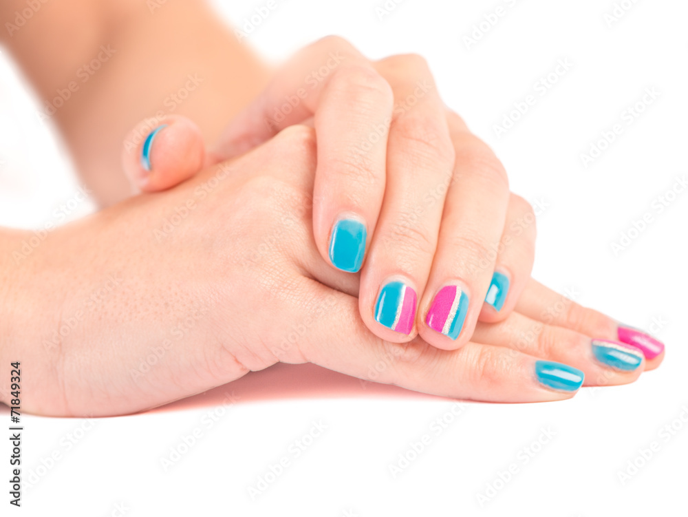 Bright manicure close up on white Bright manicure close up on white