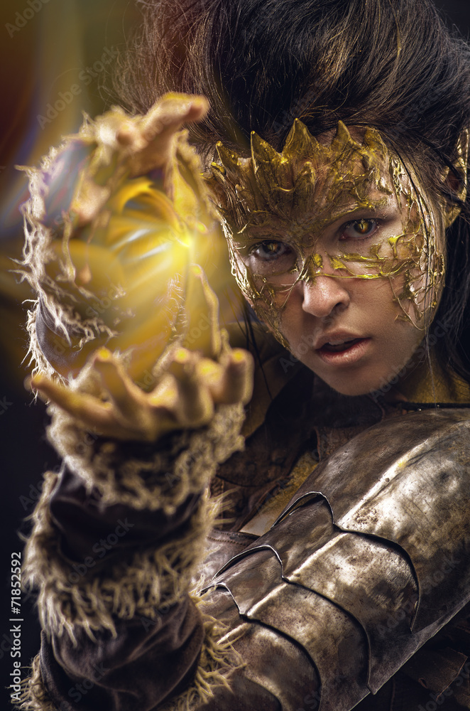 Woman in golden fantasy armour - obrazy, fototapety, plakaty 