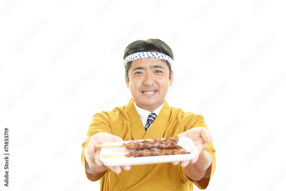 笑顔の焼き鳥屋の主人 笑顔の焼き鳥屋の主人