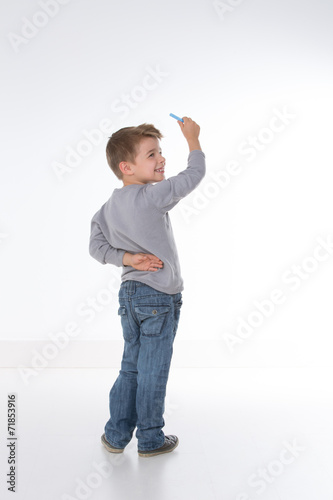 kid looks at his teacher