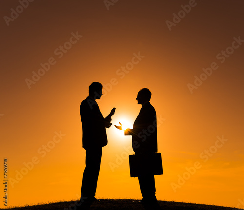 Business People Meeting in Back Lit