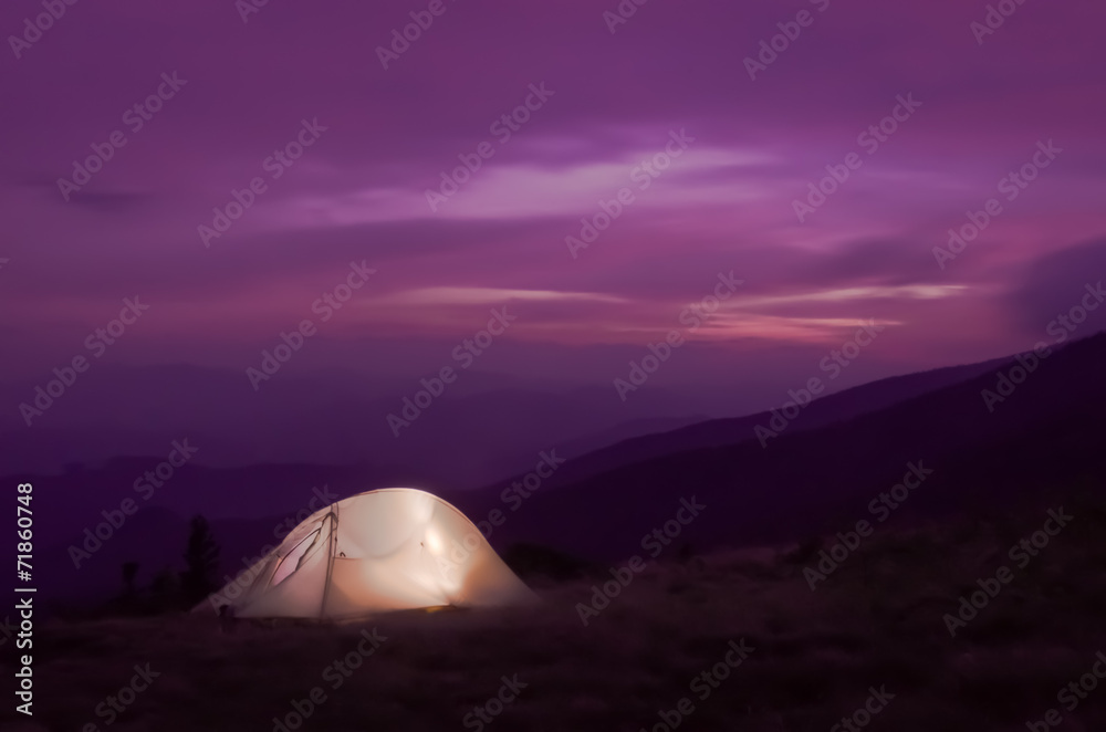 Lit up tent at Sunset