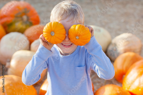 kid at pumpkin patch