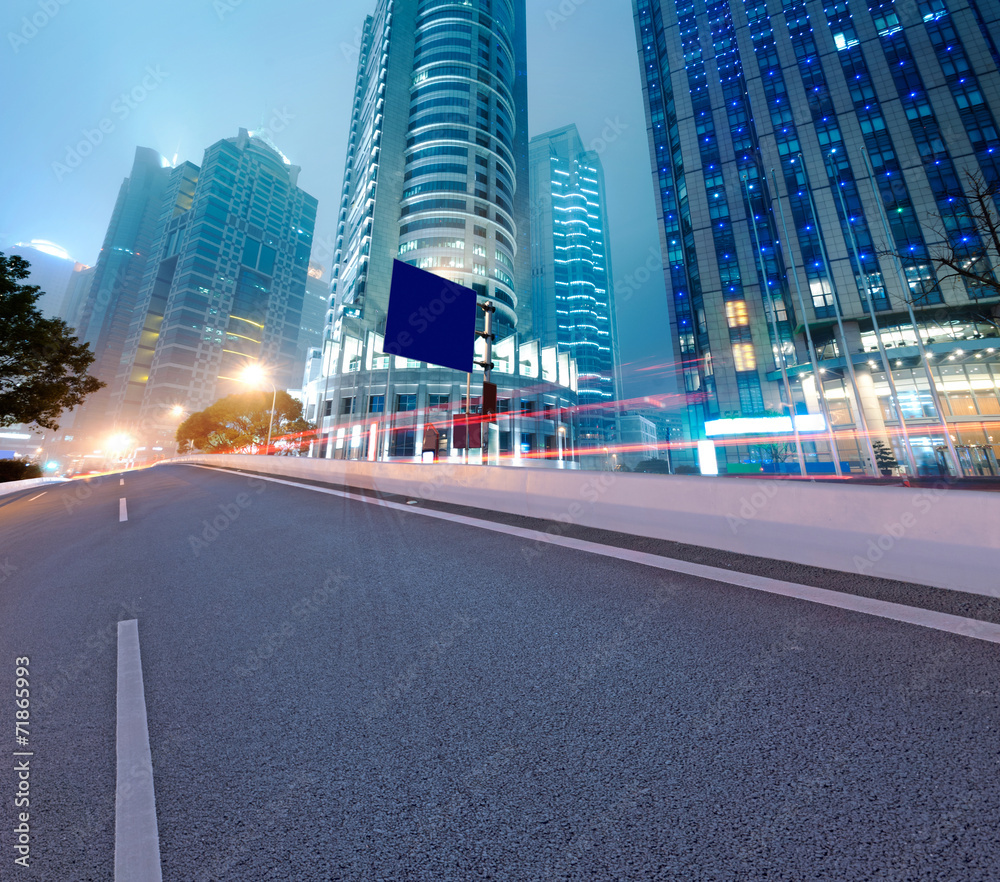 Asphalt road and modern city