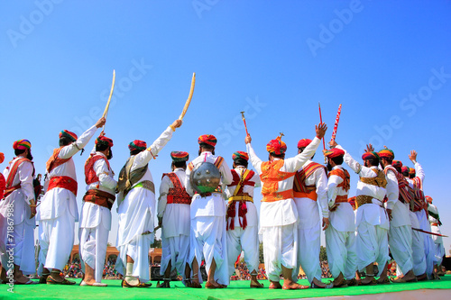 Indian men in traditional dress taking part in Mr Desert competi photo