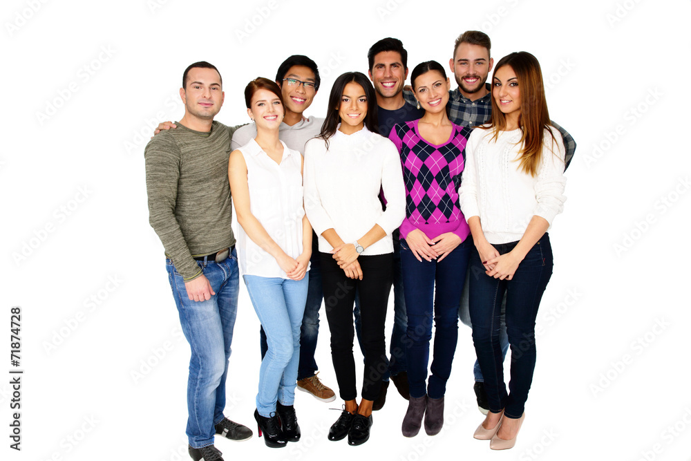 Obraz premium Group of a smiling friends standing together isolated on a white