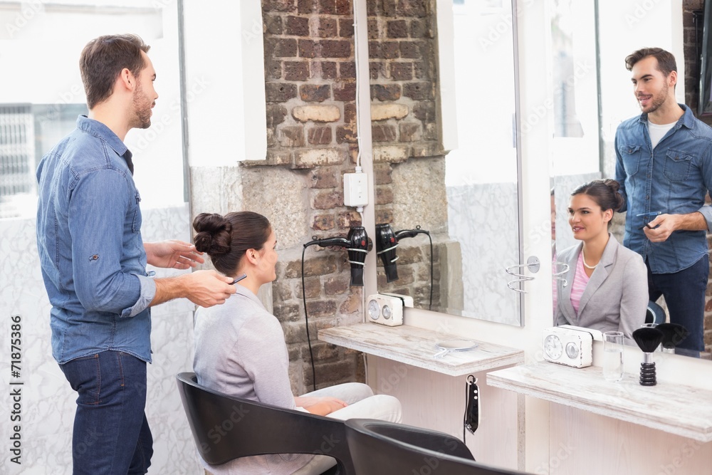 Fototapeta premium Pretty brunette getting her hair styled
