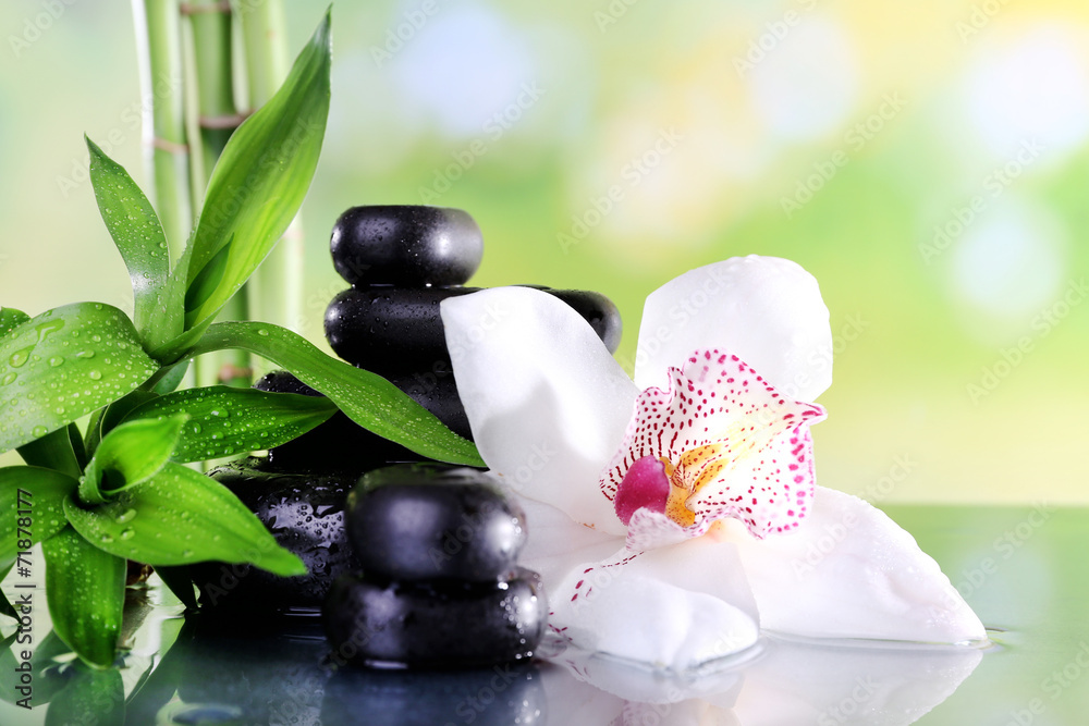 Naklejka Spa stones, bamboo branches and white orchid