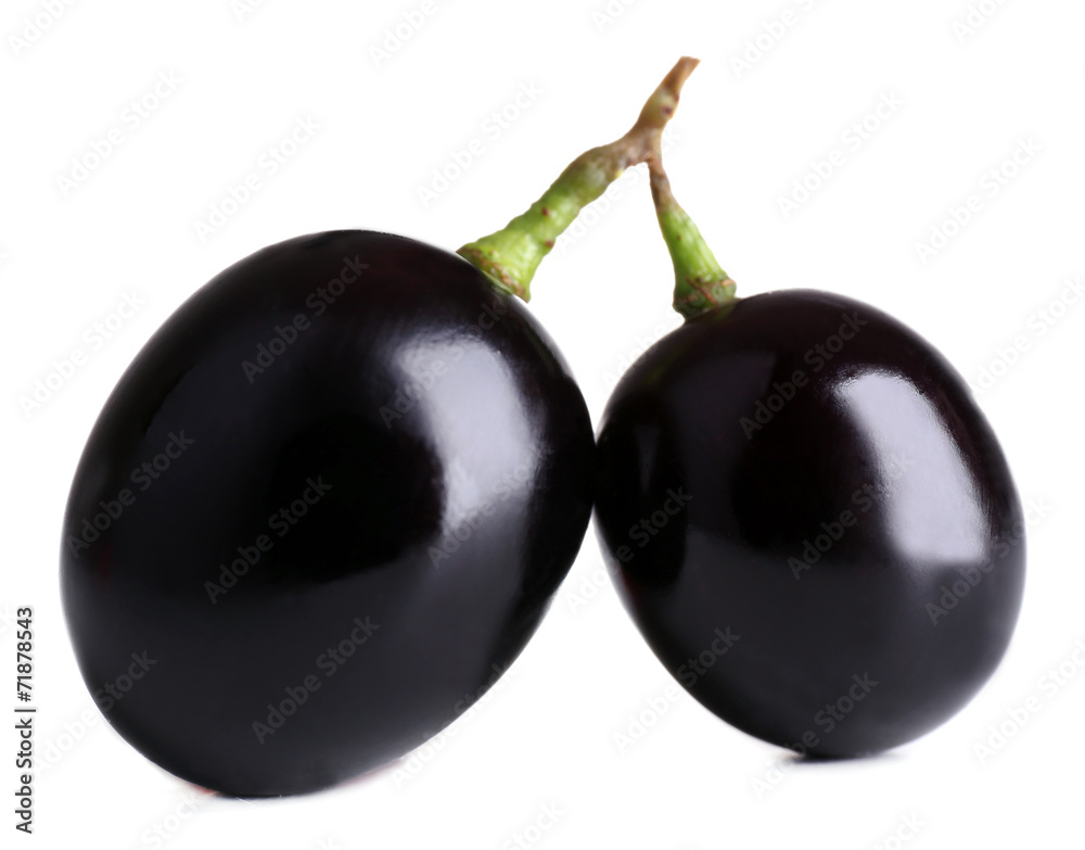 Berries of purple grapes isolated on white Berries of purple grapes isolated on white