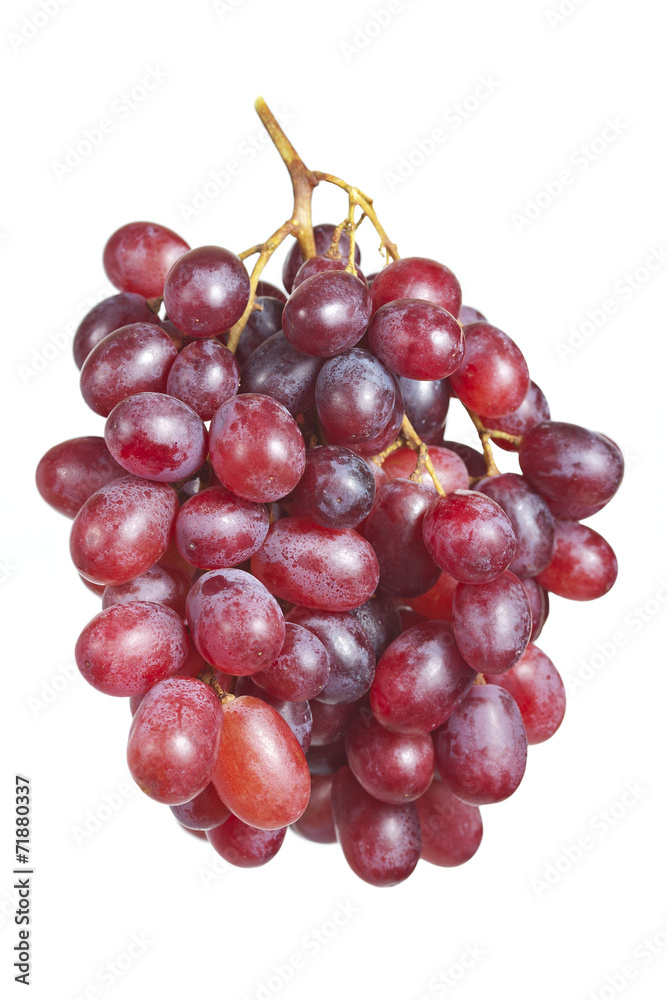 Fototapeta premium Bunch ripe, fresh red grapes isolated on a white background.