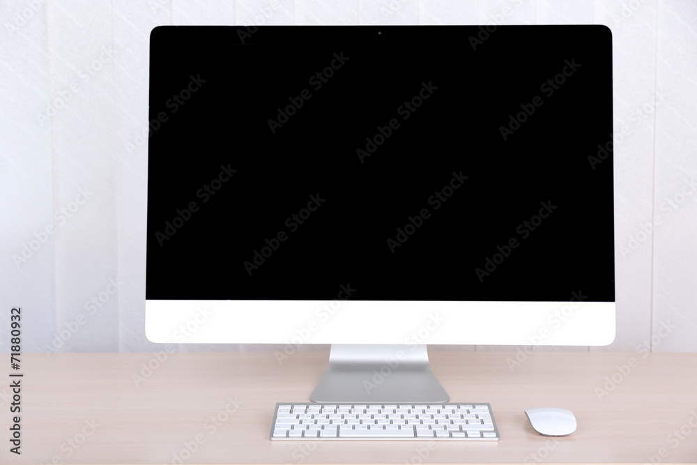 Modern computer on wooden table