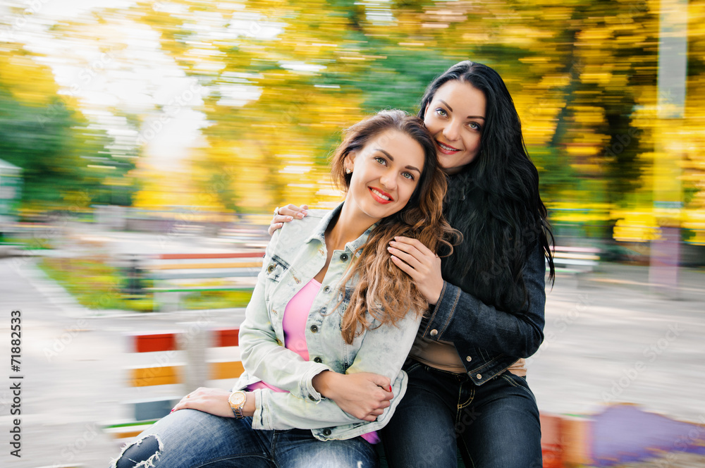 Fototapeta premium two sexy, beautiful young happy women