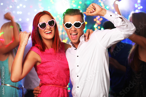 Young people dancing at party