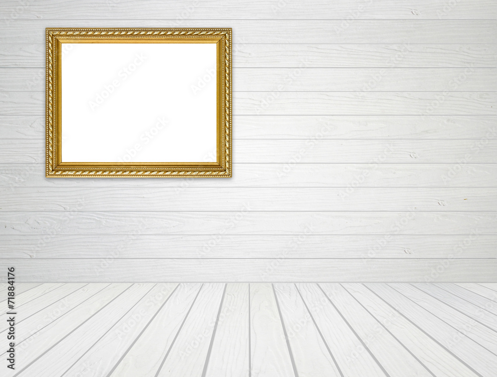 golden frame in room with white wood wall and wood floor backgro golden frame in room with white wood wall and wood floor backgro