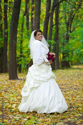 Portrait of a beautiful smiling bride © Andrey_Arkusha