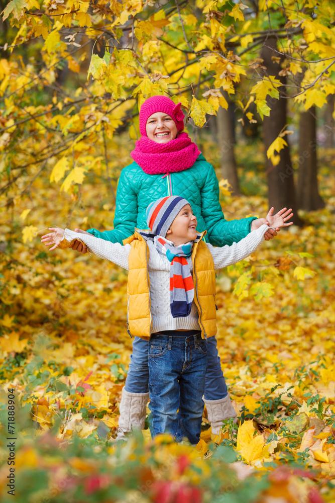 Cute kids with autumn leaves Cute kids with autumn leaves