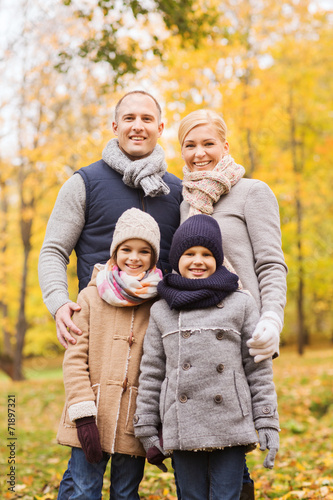happy family in autumn park © Syda Productions