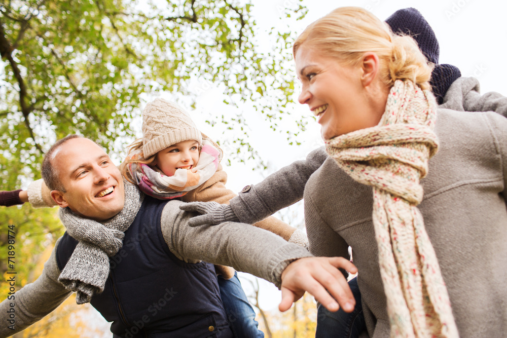 happy family having fun in autumn park happy family having fun in autumn park