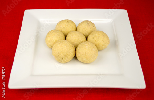 Wallpaper Mural Round Indian laddu sweets on a white square plate Torontodigital.ca